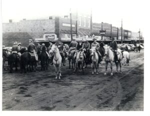 huffines auto group founder on a horse waiting for the governor of texas to arrive